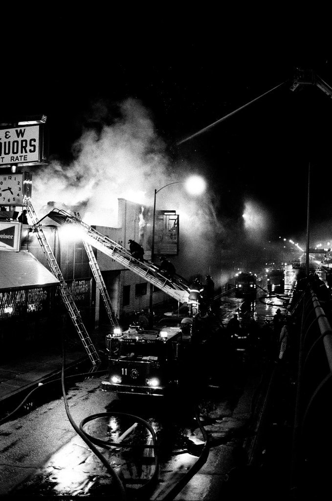 Firefighters battle a fire at a liquor store - Chicago Sun-Times