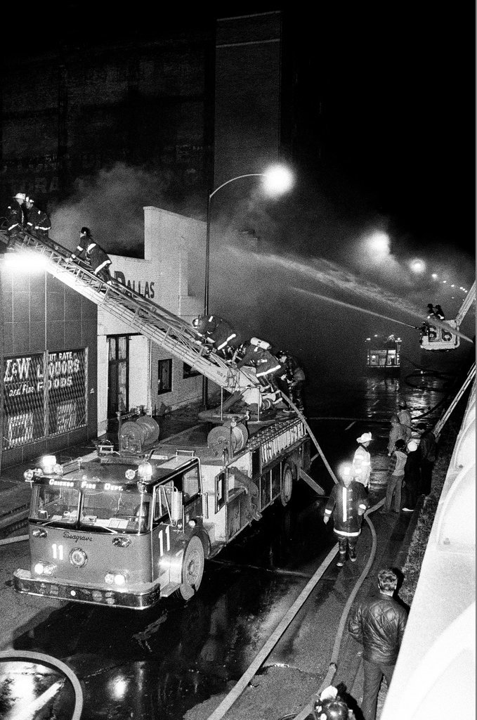 Firefighters battle a fire at a liquor store - Chicago Sun-Times