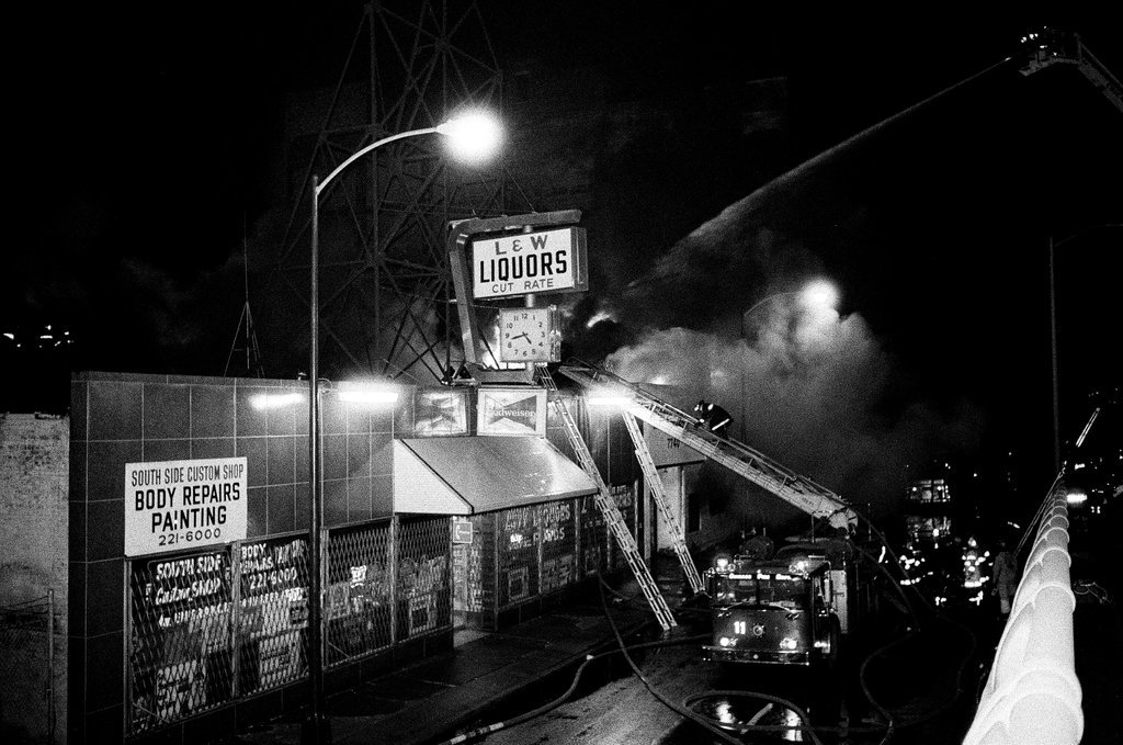 Firefighters battle a fire at a liquor store - Chicago Sun-Times