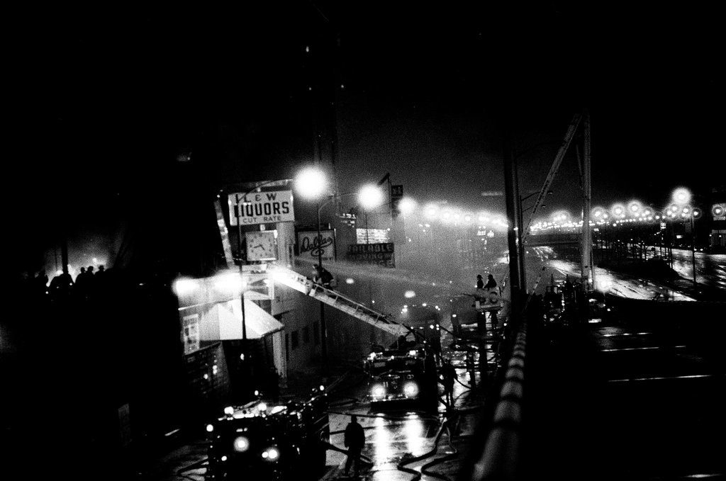 Firefighters battle a fire at a liquor store - Chicago Sun-Times