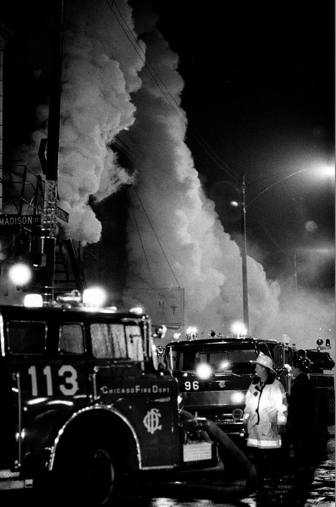 Firefighters battle a fire at a liquor store - Chicago Sun-Times