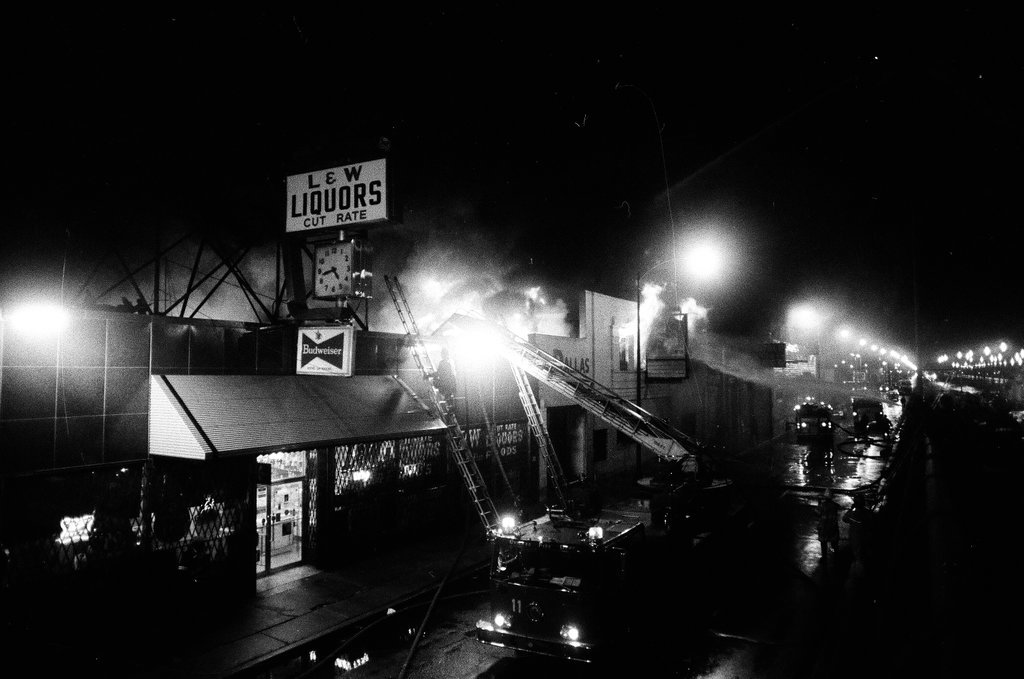 Firefighters battle a fire at a liquor store - Chicago Sun-Times
