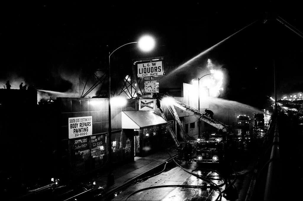 Firefighters battle a fire at a liquor store - Chicago Sun-Times