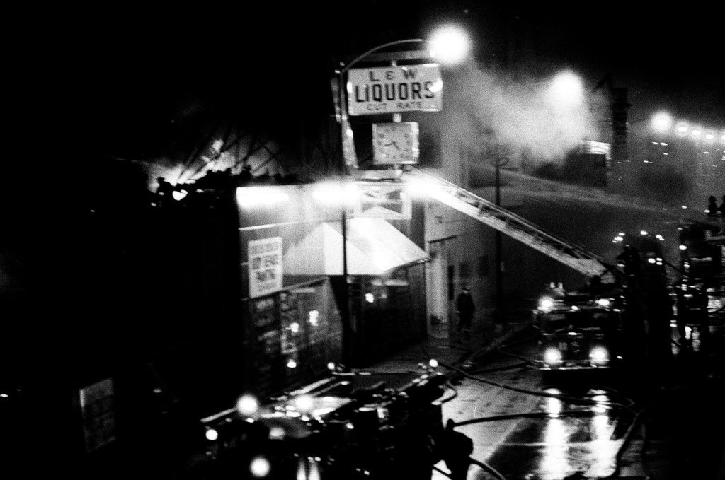 Firefighters battle a fire at a liquor store - Chicago Sun-Times