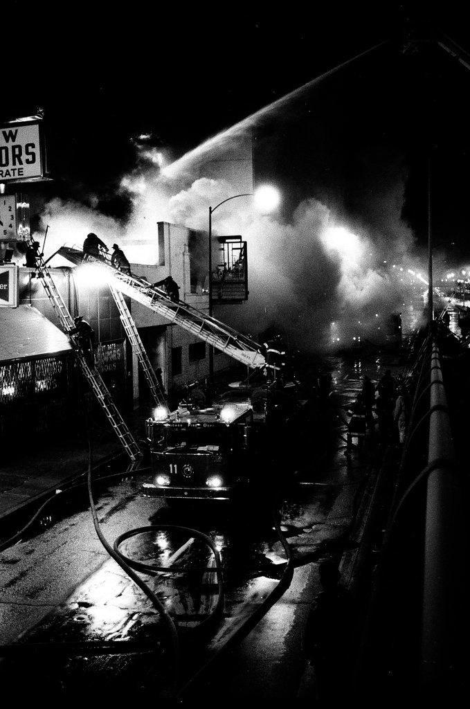 Firefighters battle a fire at a liquor store - Chicago Sun-Times