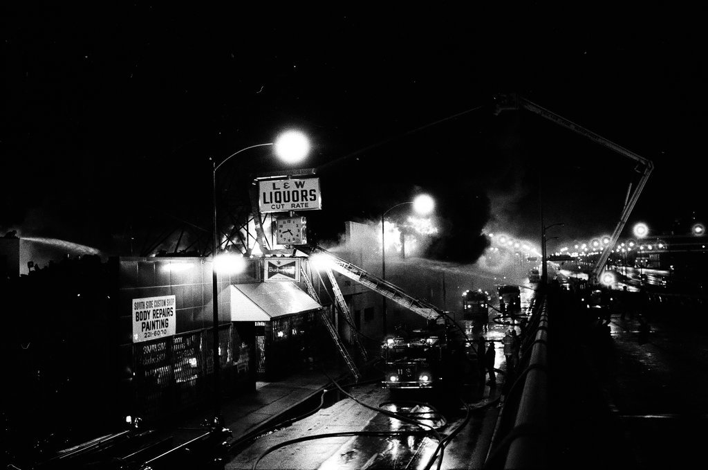 Firefighters battle a fire at a liquor store - Chicago Sun-Times