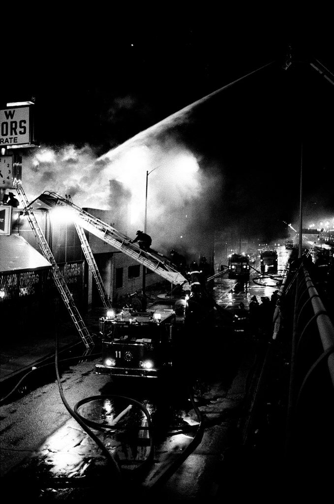 Firefighters battle a fire at a liquor store - Chicago Sun-Times