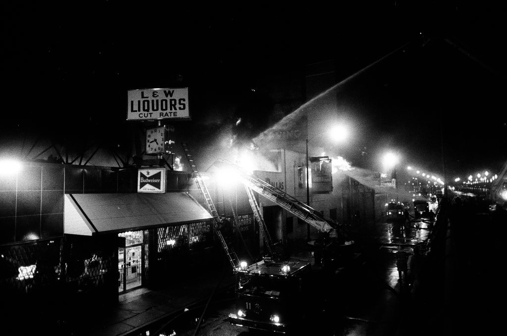 Firefighters battle a fire at a liquor store - Chicago Sun-Times