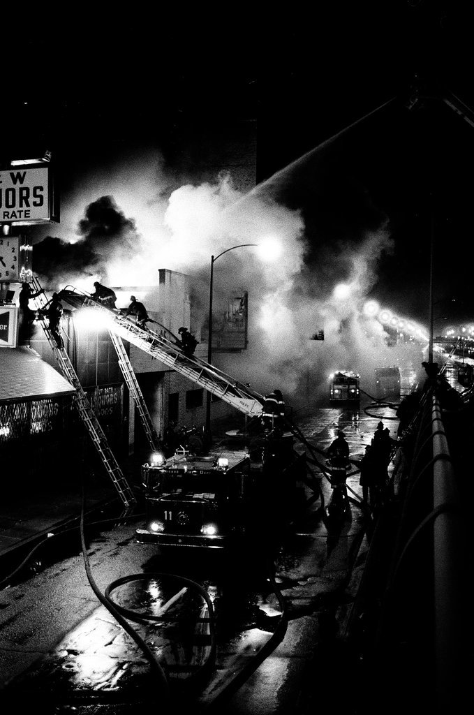 Firefighters battle a fire at a liquor store - Chicago Sun-Times