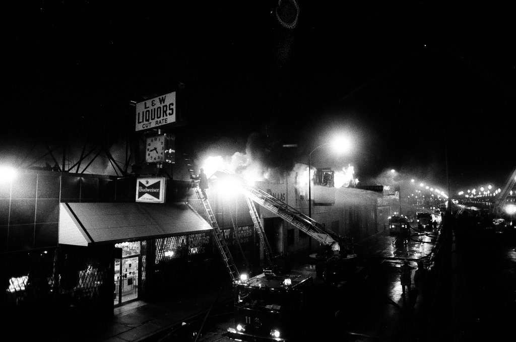 Firefighters battle a fire at a liquor store - Chicago Sun-Times