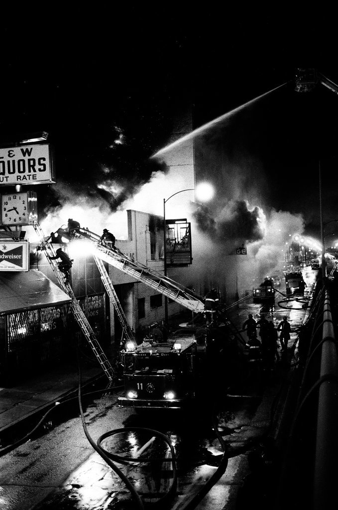 Firefighters battle a fire at a liquor store - Chicago Sun-Times
