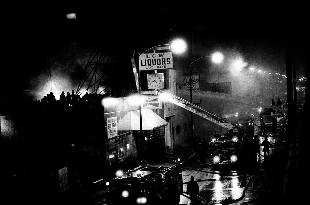 Firefighters battle a fire at a liquor store - Chicago Sun-Times