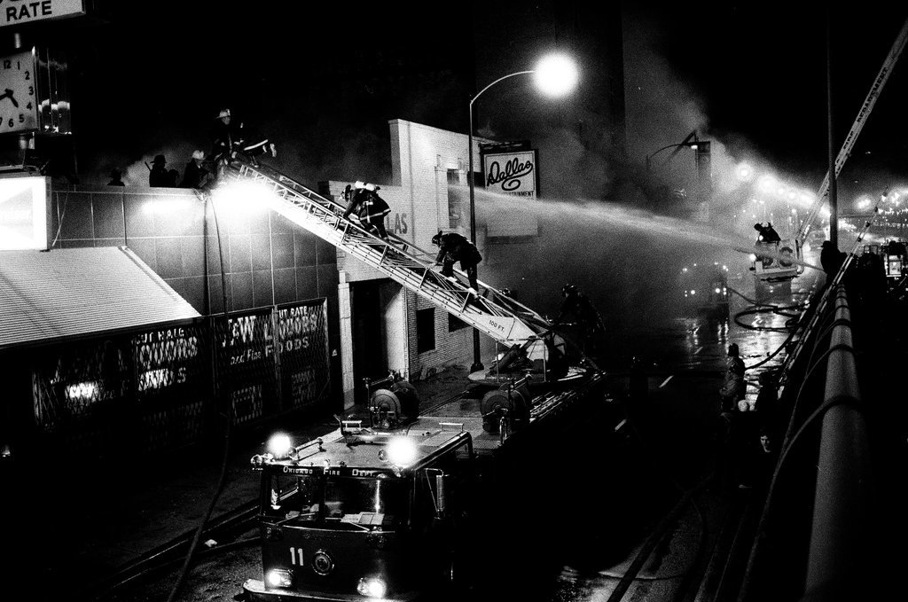 Firefighters battle a fire at a liquor store - Chicago Sun-Times