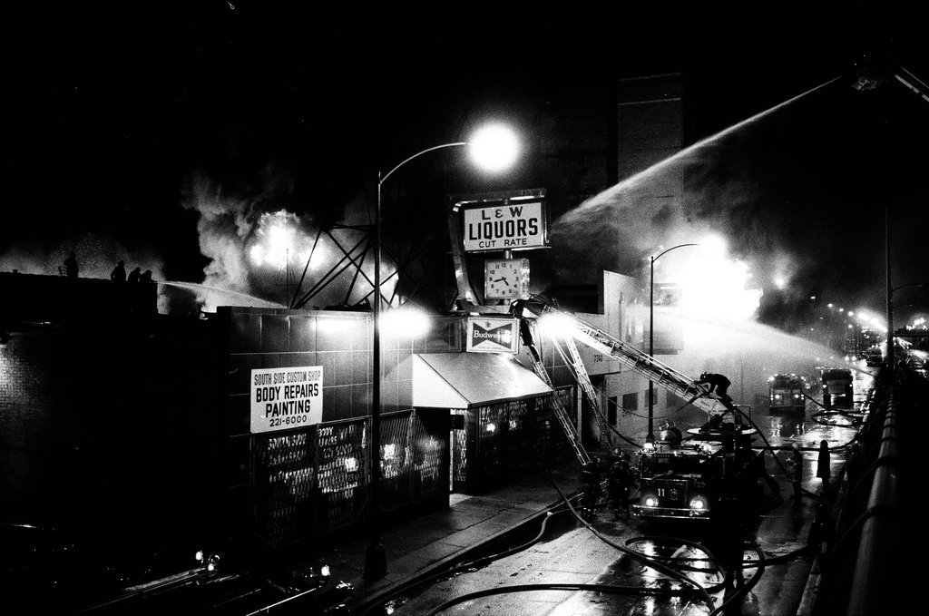 Firefighters battle a fire at a liquor store - Chicago Sun-Times