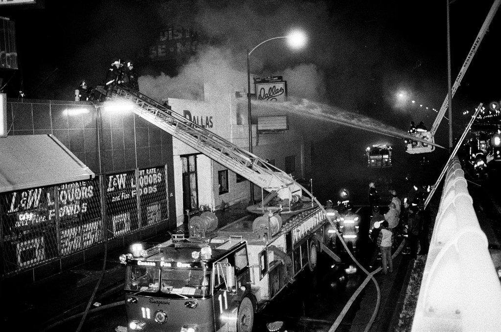 Firefighters battle a fire at a liquor store - Chicago Sun-Times