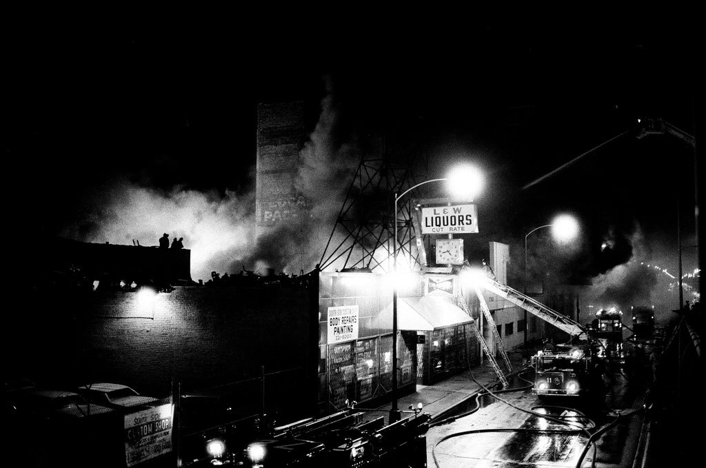 Firefighters battle a fire at a liquor store - Chicago Sun-Times
