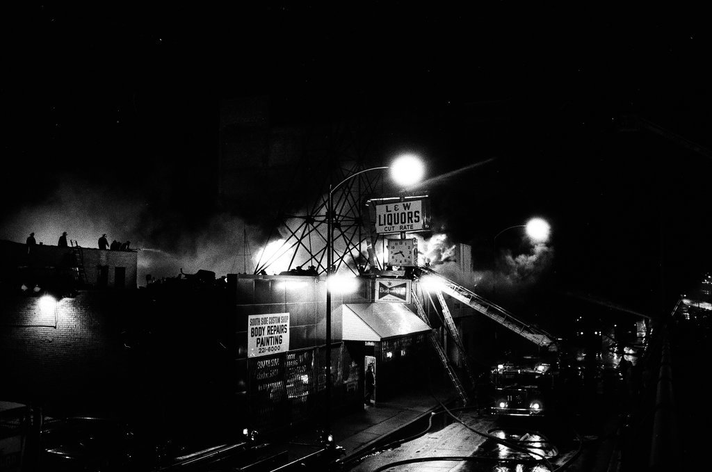 Firefighters battle a fire at a liquor store - Chicago Sun-Times