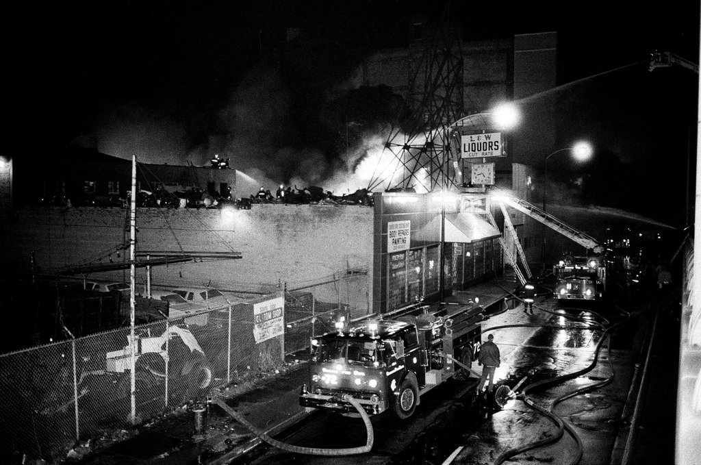 Firefighters battle a fire at a liquor store - Chicago Sun-Times