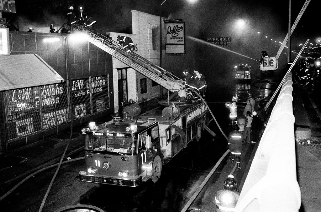 Firefighters battle a fire at a liquor store - Chicago Sun-Times