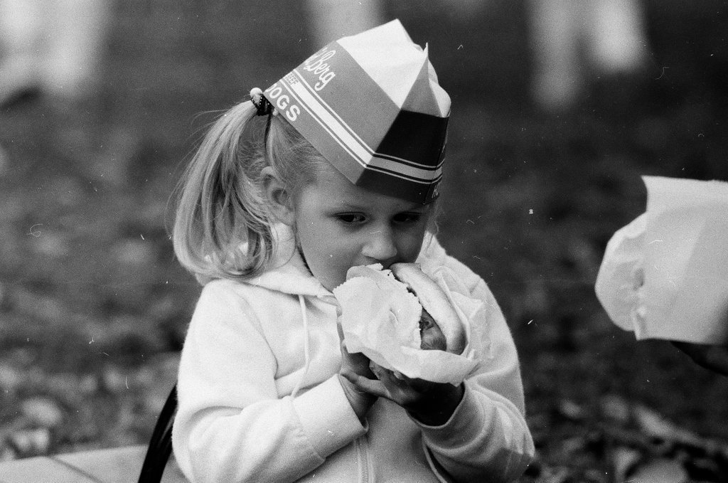Children enjoy hot dogs provided by David Berg & Company - Chicago Sun-Times