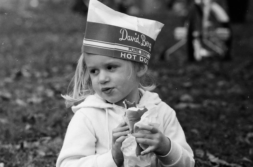 Children enjoy hot dogs provided by David Berg & Company - Chicago Sun-Times