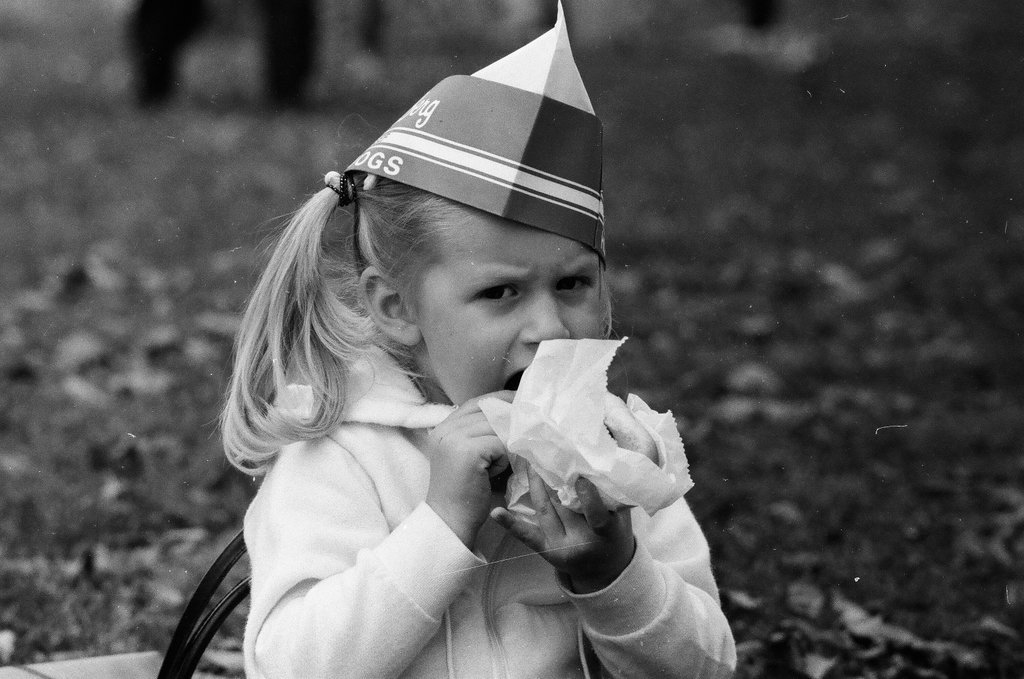 Children enjoy hot dogs provided by David Berg & Company - Chicago Sun-Times