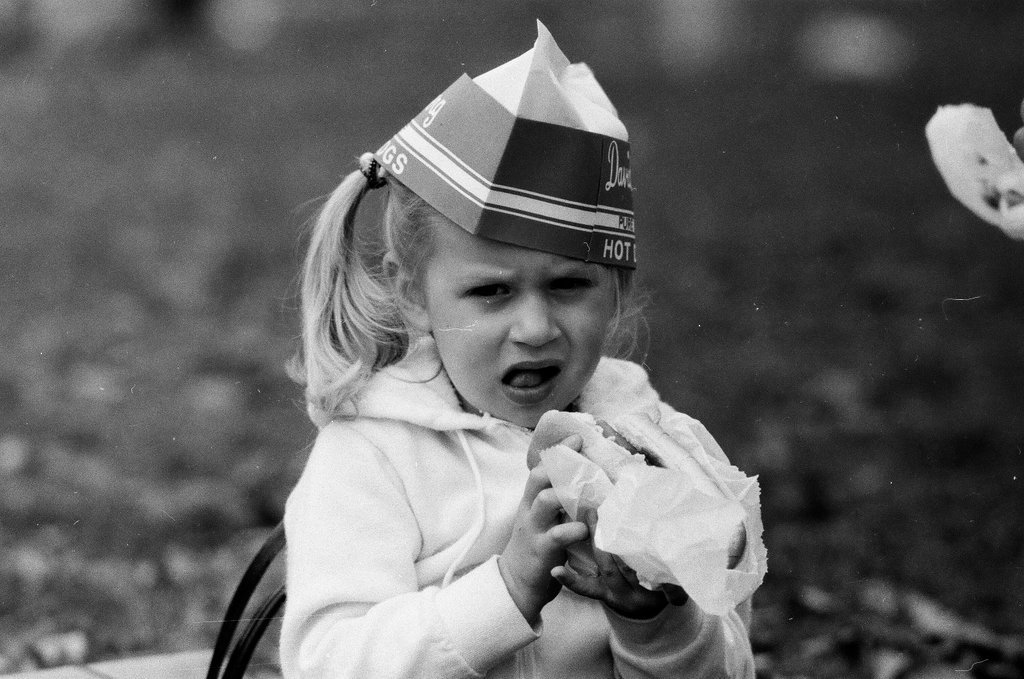 Children enjoy hot dogs provided by David Berg & Company - Chicago Sun-Times