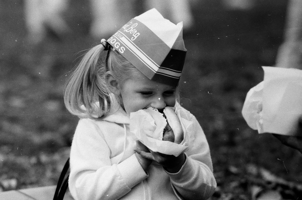 Children enjoy hot dogs provided by David Berg & Company - Chicago Sun-Times