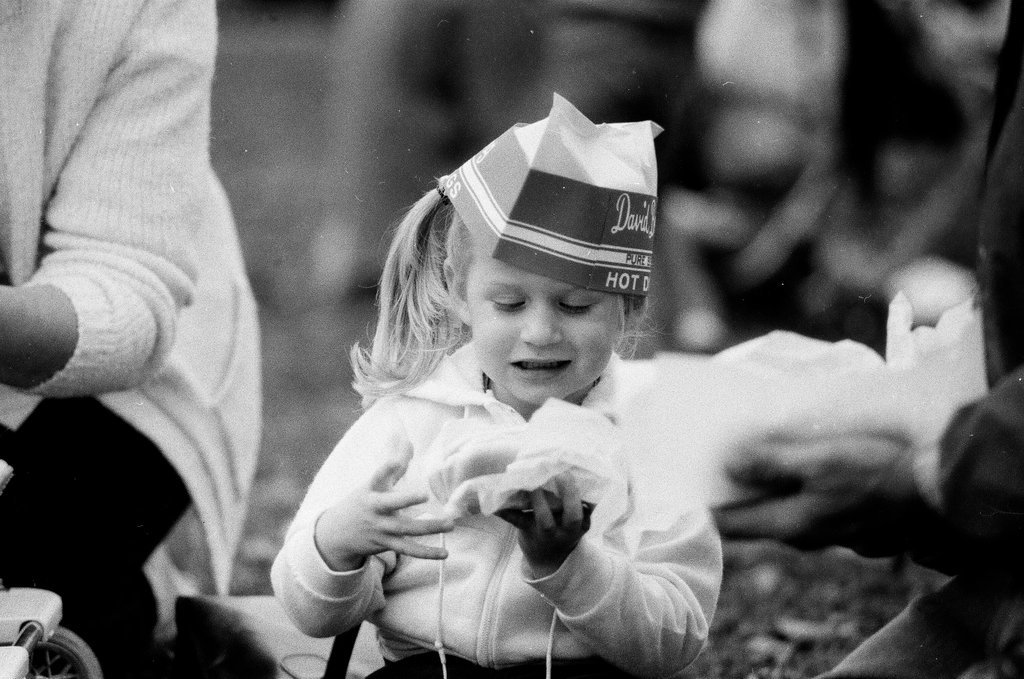 Children enjoy hot dogs provided by David Berg & Company - Chicago Sun-Times