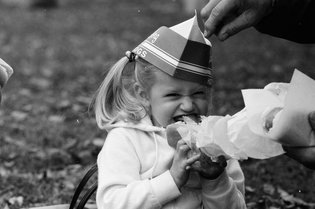 Children enjoy hot dogs provided by David Berg & Company - Chicago Sun-Times