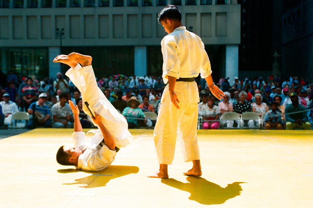Individuals demonstrate Aikido martial art sequences at Daley Plaza - Chicago Sun-Times