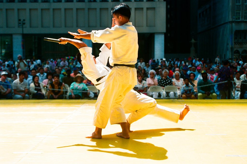Individuals demonstrate Aikido martial art sequences at Daley Plaza - Chicago Sun-Times