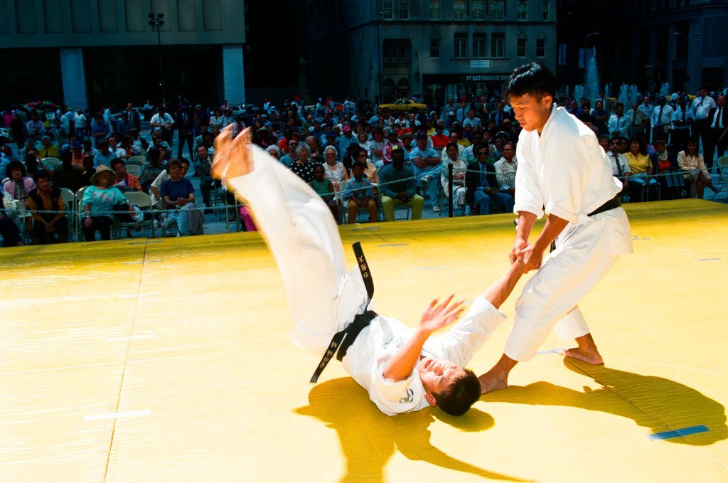 Individuals demonstrate Aikido martial art sequences at Daley Plaza - Chicago Sun-Times