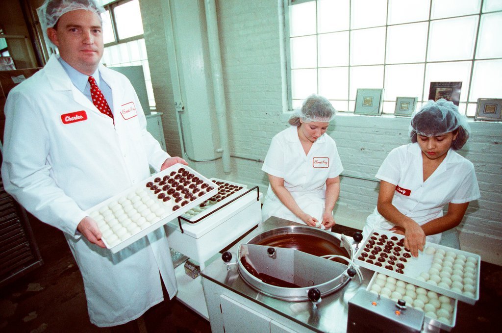 Employees at Fannie May Candies share the production process of truffles - Chicago Sun-Times