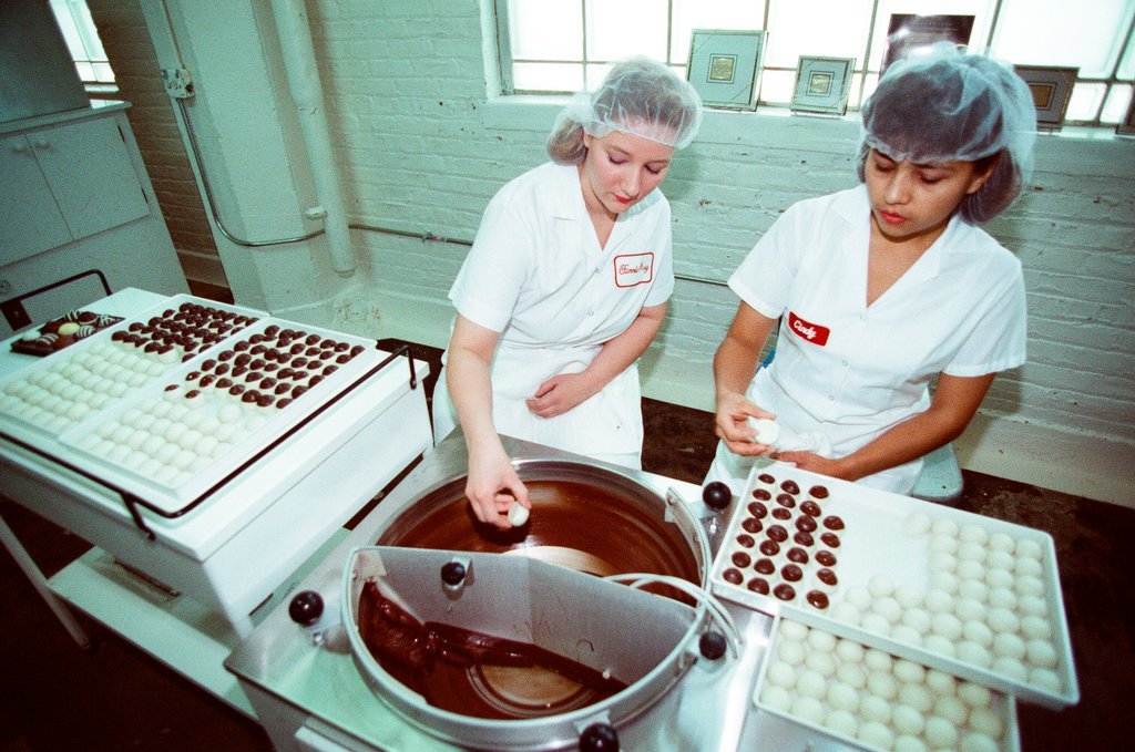 Employees at Fannie May Candies share the production process of truffles - Chicago Sun-Times