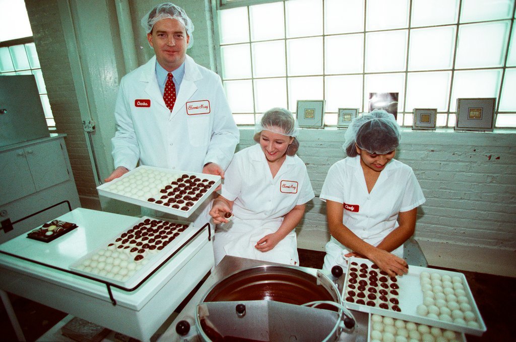 Employees at Fannie May Candies share the production process of truffles - Chicago Sun-Times
