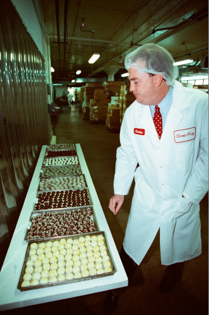 Employees at Fannie May Candies share the production process of truffles - Chicago Sun-Times
