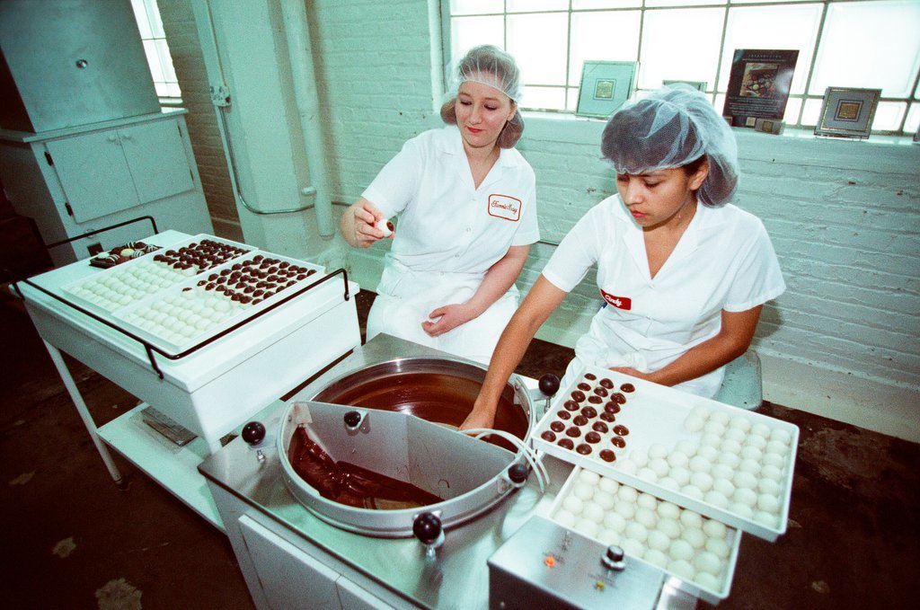 Employees at Fannie May Candies share the production process of truffles - Chicago Sun-Times