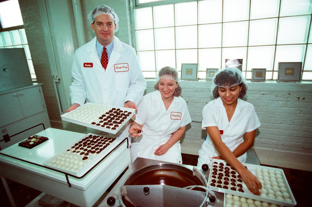 Employees at Fannie May Candies share the production process of truffles - Chicago Sun-Times