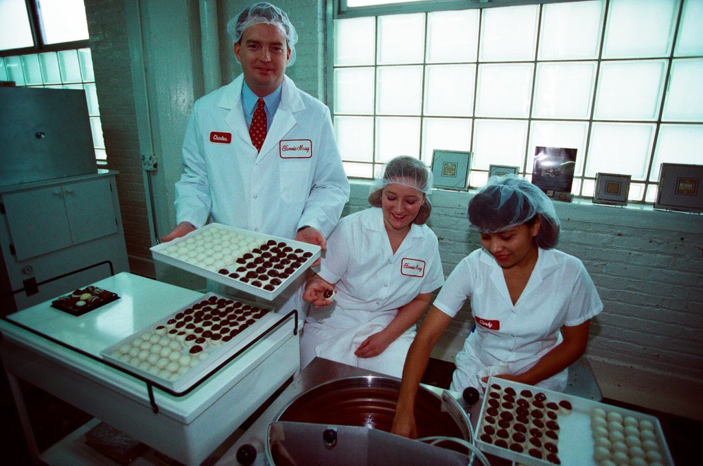Employees at Fannie May Candies share the production process of truffles - Chicago Sun-Times