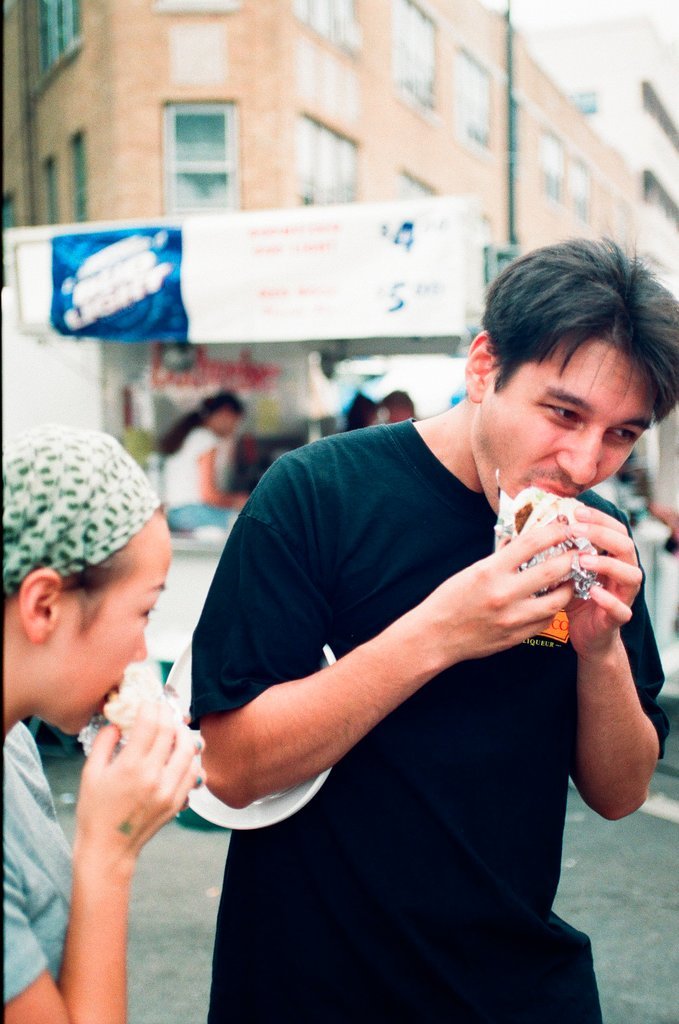 Visitors enjoy food, live music, and viewing art vendors at the Taste of Lincoln Avenue - Chicago Sun-Times