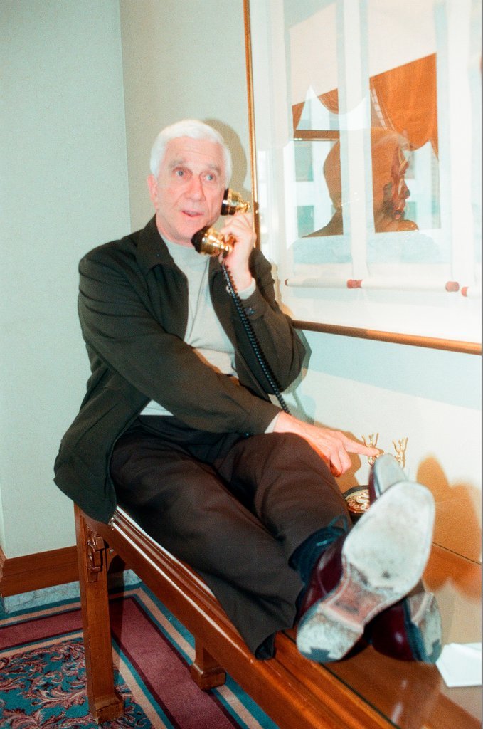 Actor Leslie Nielsen poses for photographs in the Renaissance Hotel - Chicago Sun-Times