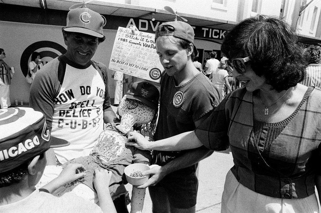 Lifelong Chicago Cubs fan Jerry Pritikin poses with a voodoo doll - Chicago Sun-Times