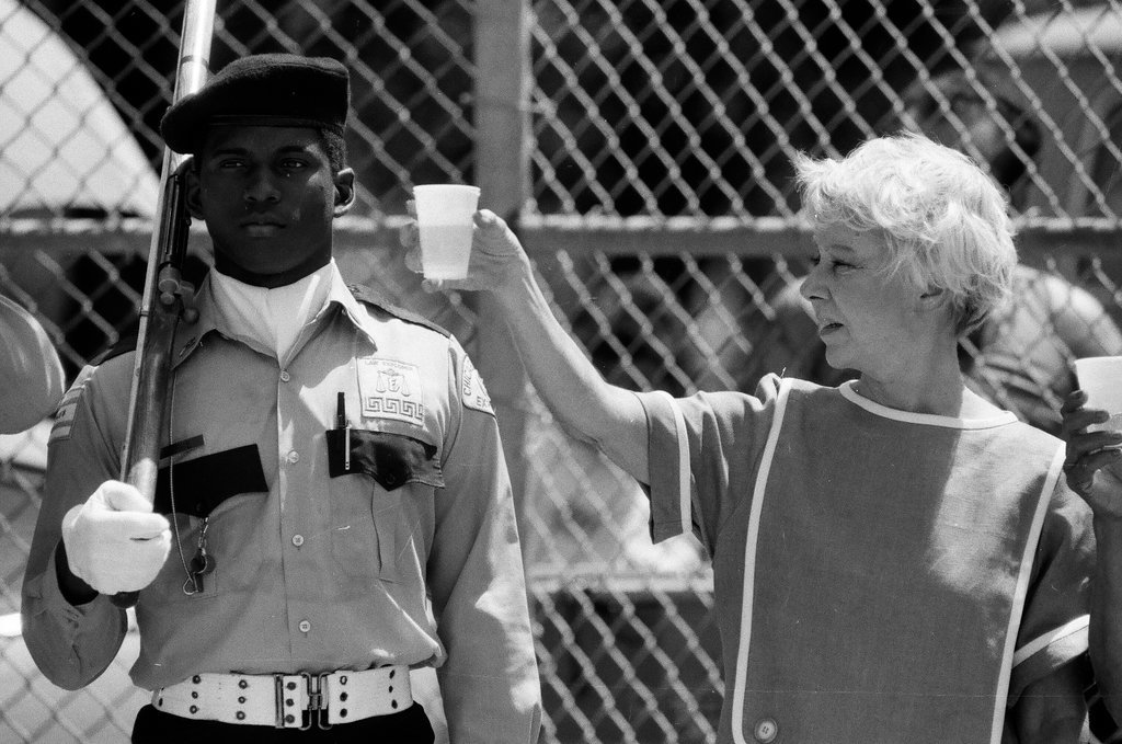 Former mayor Jane Byrne throws the first pitch to begin the Puerto Rican summer softball league season - Chicago Sun-Times
