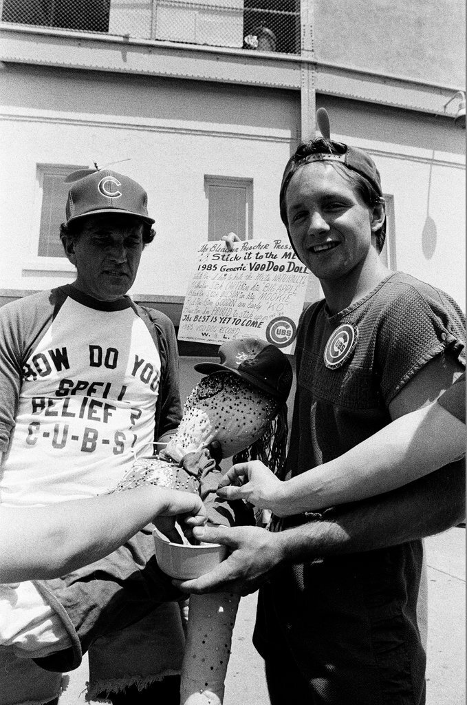 Lifelong Chicago Cubs fan Jerry Pritikin poses with a voodoo doll - Chicago Sun-Times