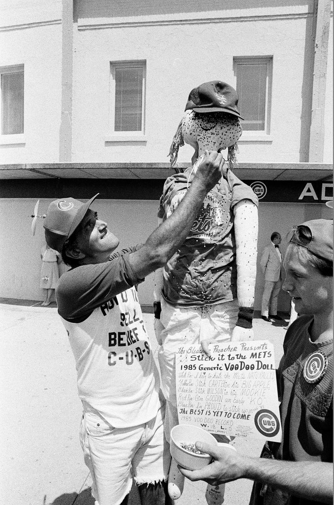 Lifelong Chicago Cubs fan Jerry Pritikin poses with a voodoo doll - Chicago Sun-Times