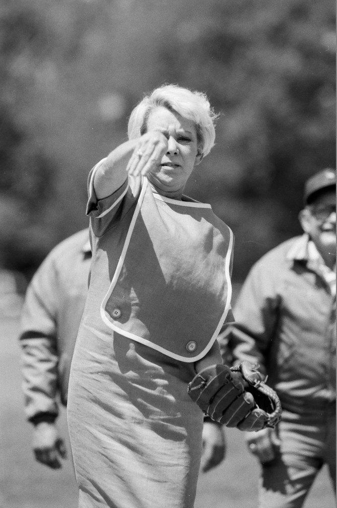 Former mayor Jane Byrne throws the first pitch to begin the Puerto Rican summer softball league season - Chicago Sun-Times