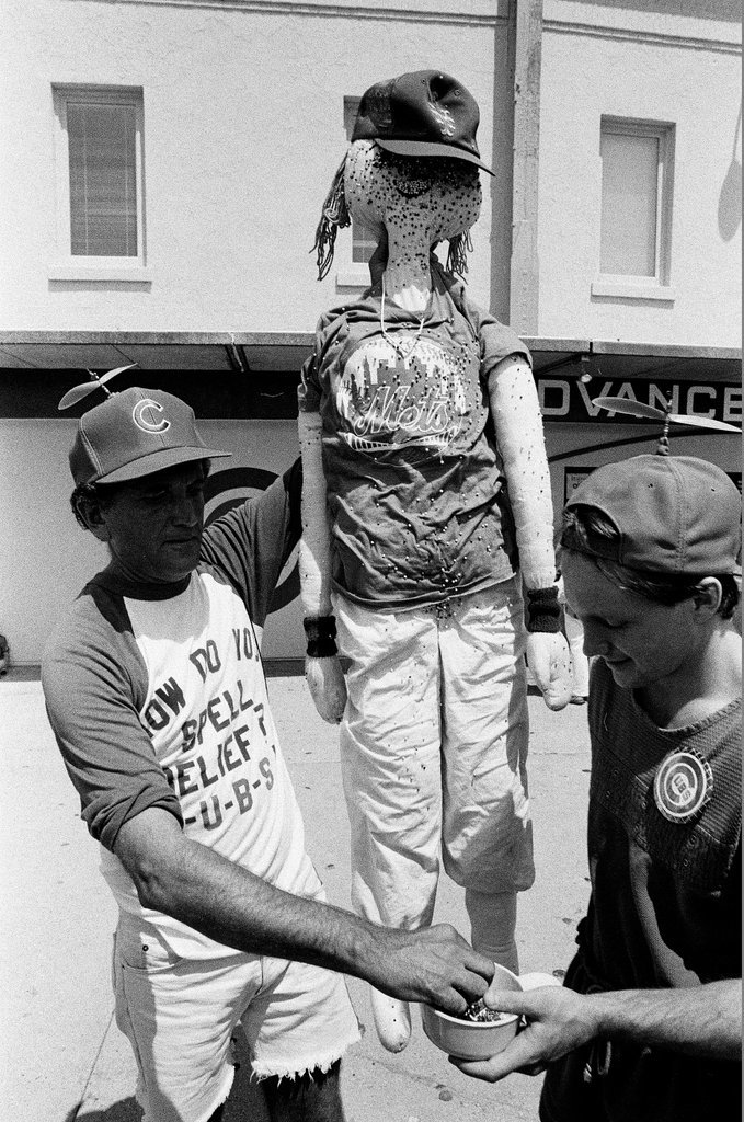 Lifelong Chicago Cubs fan Jerry Pritikin poses with a voodoo doll - Chicago Sun-Times