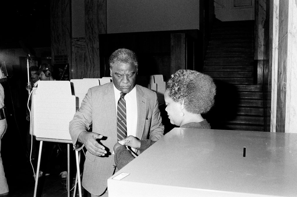 Mayor Harold Washington votes in the 1st Congressional primary - James (Jim) Klepitsch for Chicago Sun-Times