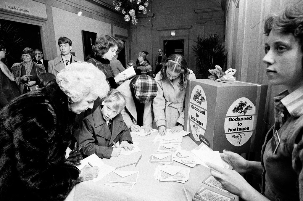 People write and send Christmas cards to fifty American hostages being held in Iran - Chicago Sun-Times